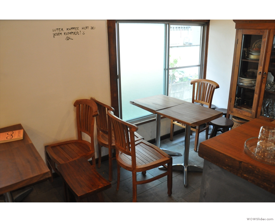 This one is on the right, beyond the counter. Again, it's a pair of two-person tables.