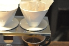 Another cup of pour-over is prepared for an interested coffee-drinker.