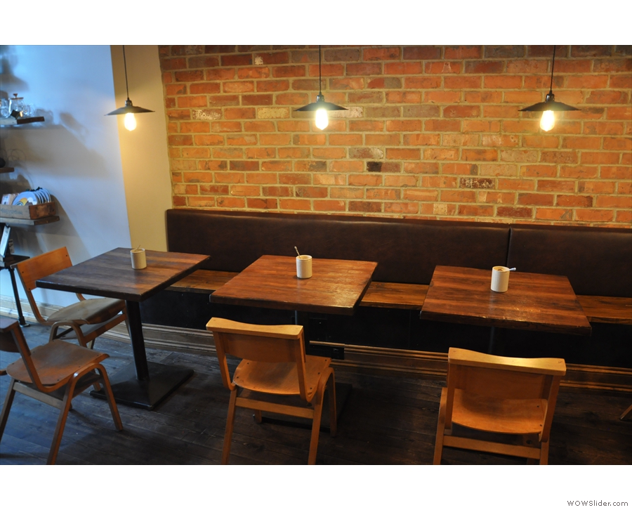 Next, more seating, starting with these two-person tables along the left-hand wall...