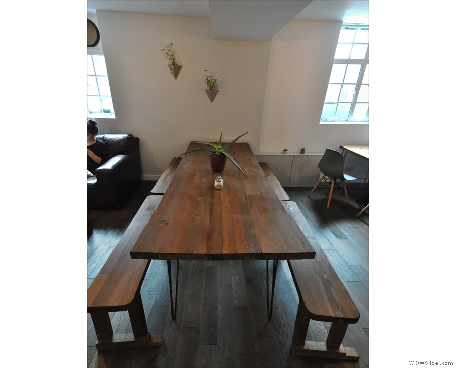 Next comes this magnificent communal table running almost the full width of the room...