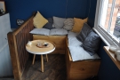It's this cosy L-shaped bench and its coffee table, which slots in...