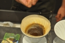 The barista is aiming for a three-minute extraction here and it is almost done.