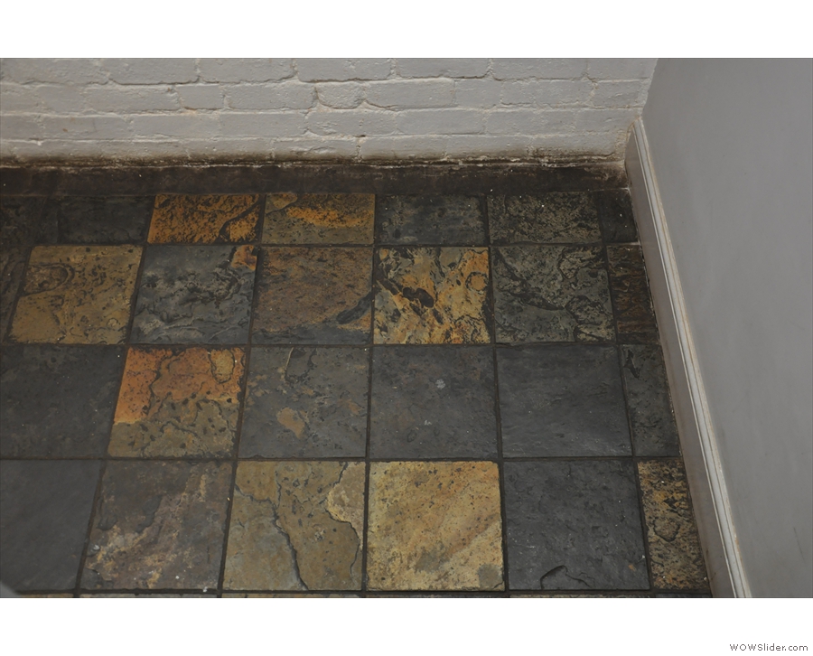 ... an amazing basement with a gloriously-tiled floor.