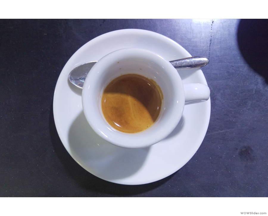 My espresso, in a classic white cup. That's all I was going to have, but my barista, Iris...