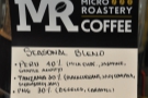 Details of the seasonal house blend are displayed on the grinnder.