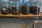 Most of the coffee is stored in bins, but some is placed in these jars.