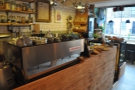 The counter is organised with the espresso machine down the side...