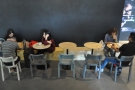 AUNN Cafe has a range of seating, including this bench and tables.