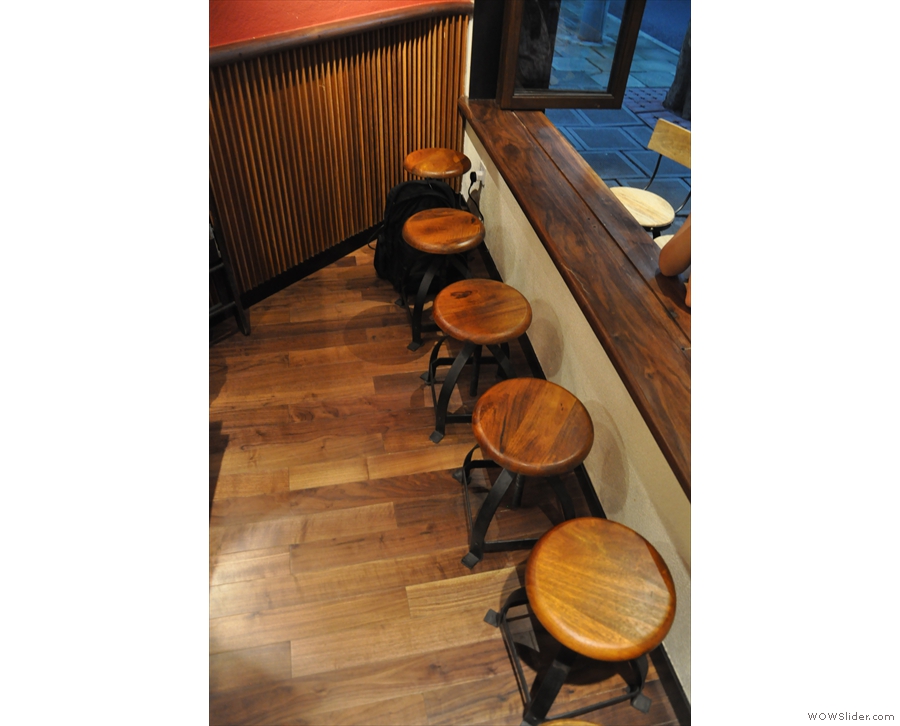 ... and then next to that, a row of five stools at the window-bar.
