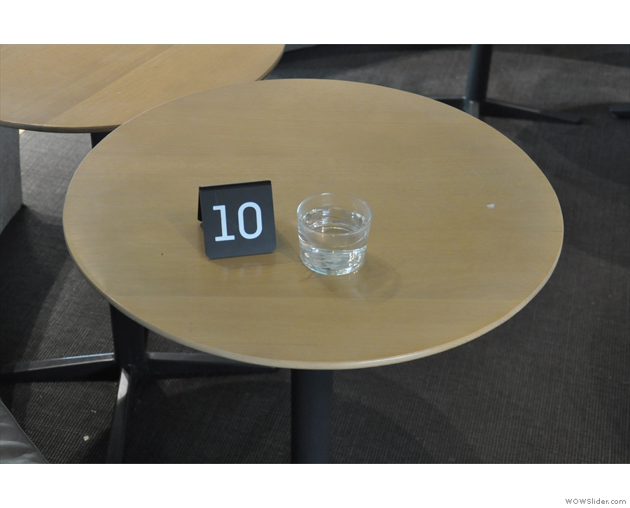 Once you order, you get a number and a glass of (warm) water while you wait.