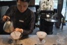 Blooming is the process of letting the gases in the coffee come out before the main pour.