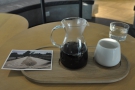 My coffee, an Ethiopian Burtukaana, served in a carafe, on a tray, cup on the side.