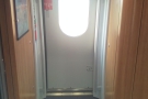 The areas around the doors, which are at each end of the carriage, are spacious as well...