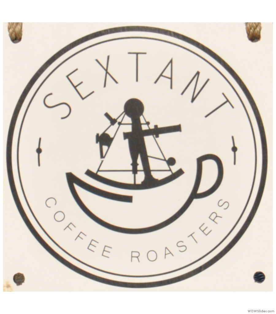 San Francisco's Sextant Coffee Roasters. A beautiful brick workshop with lighting to match.