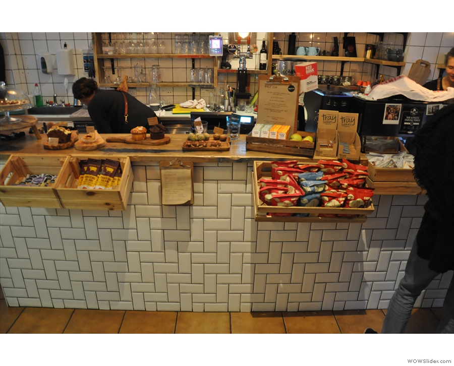 The beautifully-tiled counter is laden with goodies.