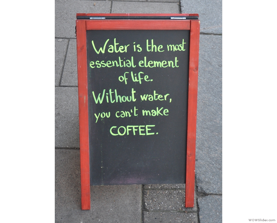The A-board outside on the pavement is both philosophical and, on the other side...