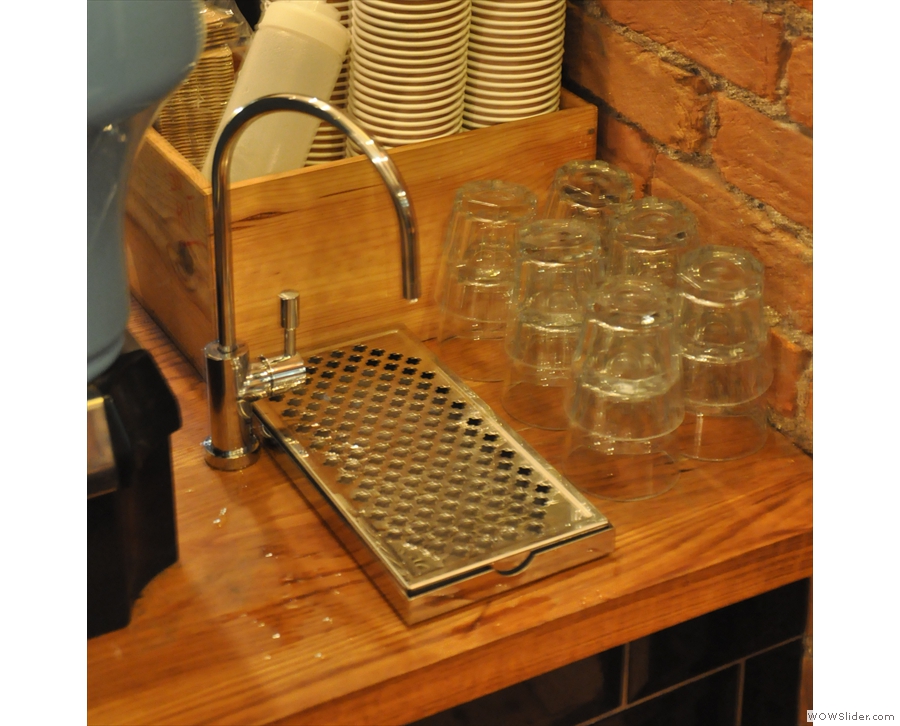 One minor change: there's now a tap by the espresso machine rather than bottles of water.