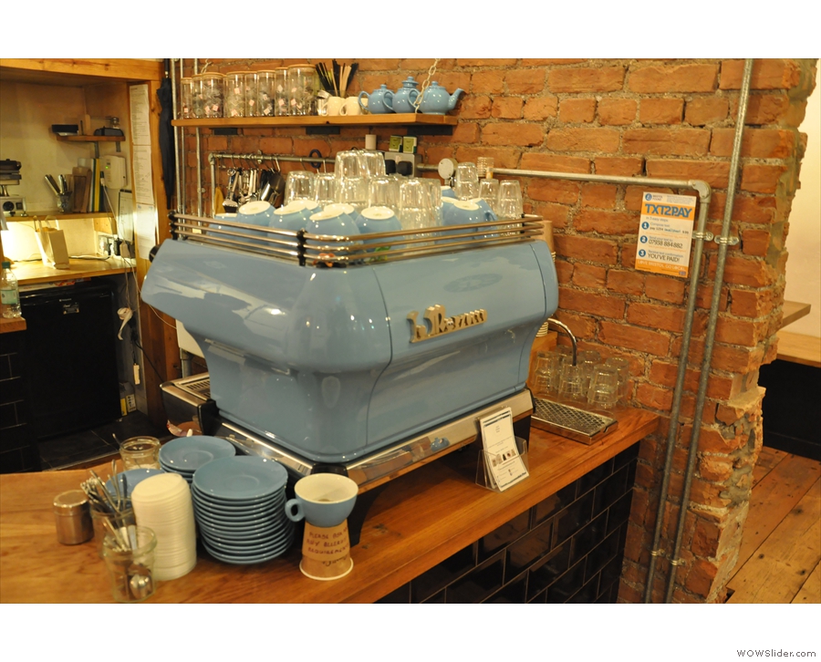 The La Marzocco espresso machine is worth a look: its custom paint job matches the cups.