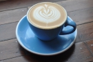 My flat white, served in a beautiful, classic blue cup...
