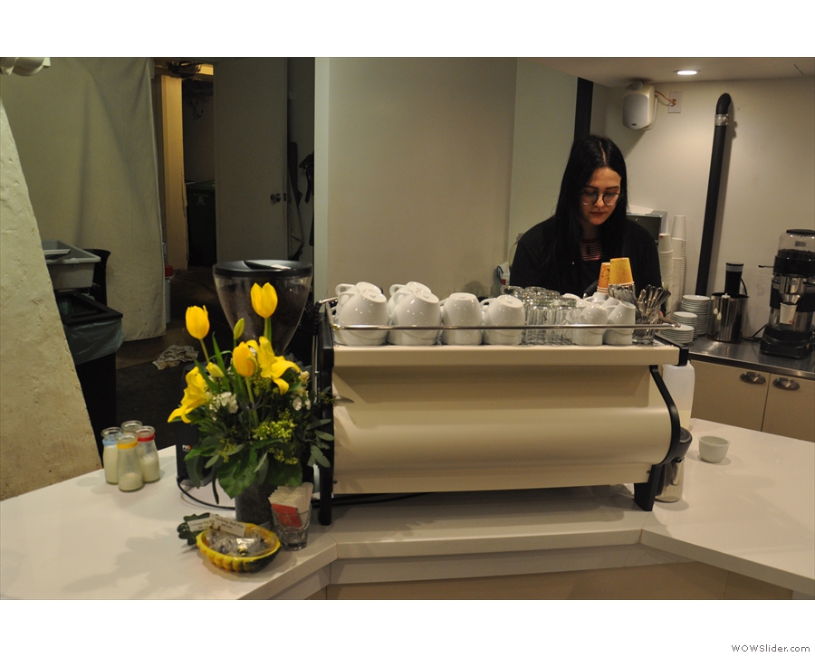 Meanwhile the espresso machine, and the flowers, are on the right on a 45 degree angle.