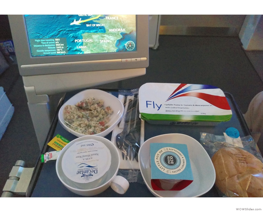Food arrived somewhere west of the Bay of Biscay, about 90 minutes into the flight.