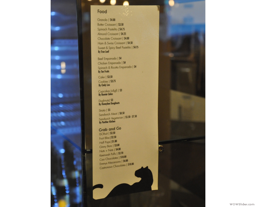 A menu describes the various goodies available, including cakes and sandwiches.