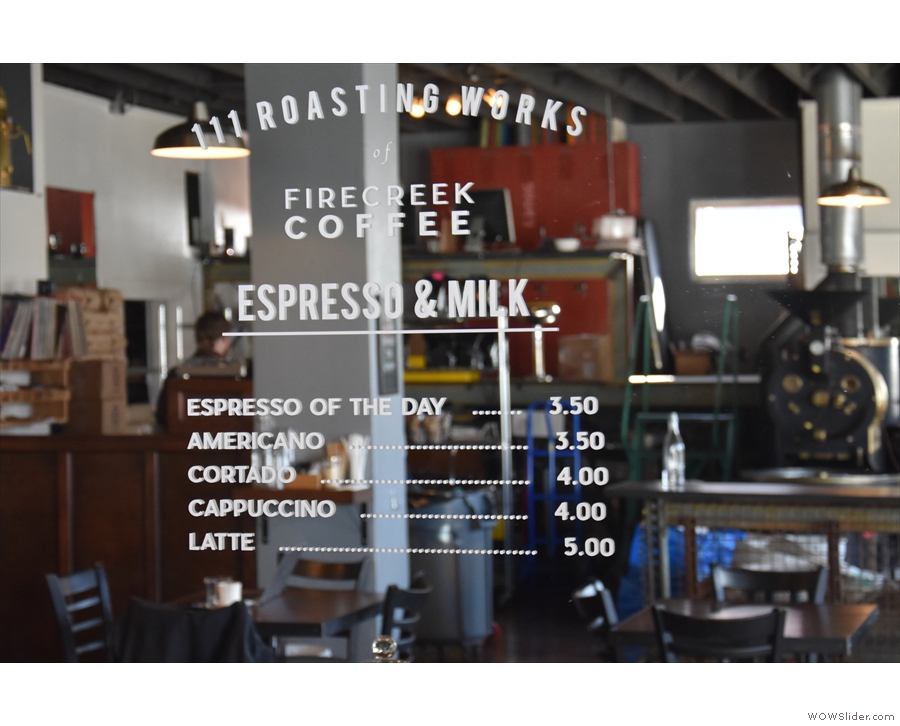 The simple menu is written on the mirror behind the espresso bar.