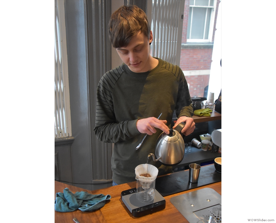 Callum starts off with a short first pour to allow the coffee to bloom.