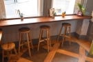 The window-bar with its three high stools in more detail.