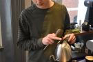 Callum employs a single-pour technique, filling the V60 up to the top...