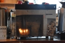 A reflection of the stove in the Sanremo Espresso machine.