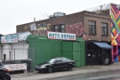 On Brooklyn's Vanderbilt Ave, sandwiched between an auto repair workshop on one side...