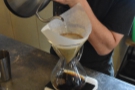 Interestingly, he employs a single, continuous pour into the centre of the Chemex.