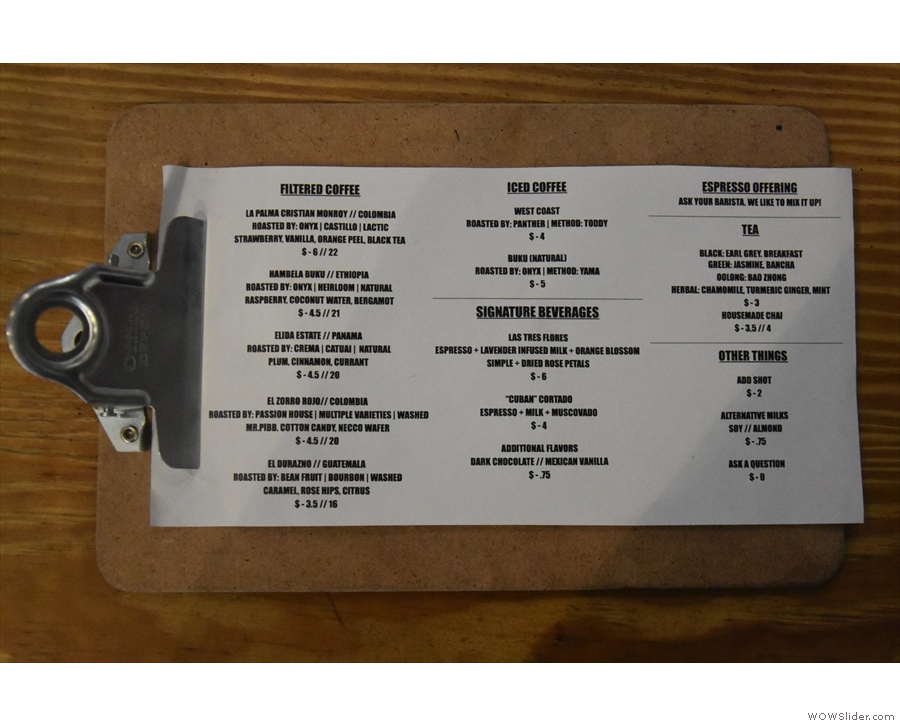 ... while the current pour-over choices are listed on a clipboard on the counter-top.