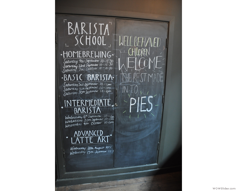 Details of the courses are posted on a blackboard by the window at the front.