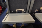 Down comes the tray table...