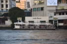A public ferry runs between there and the Hilton. There are two boats, the white one...