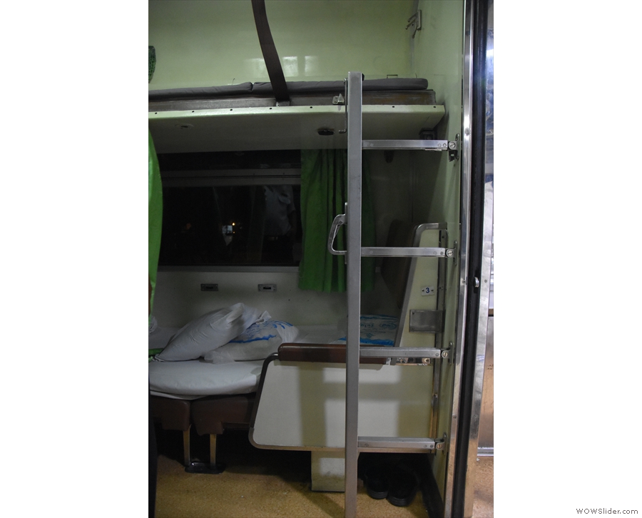 The bunk at the end, where there is no luggage rack, has its own ladder...