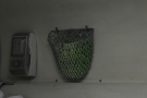 ... while there's an individual reading light and handy mesh basket for keeping small items.