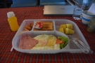 My breakfast, served, as the night before, in a plastic tray.