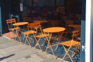 The small outside seating area catches the afternoon sun.
