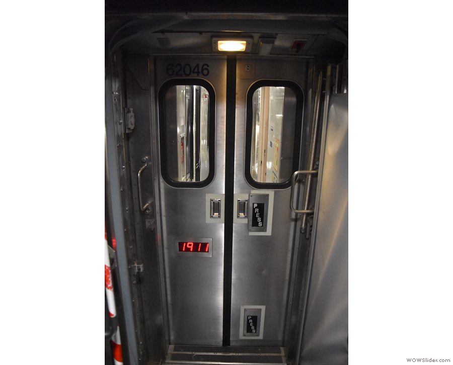 Note the doors between carriages with both push-to-open and kick-to-open buttons.