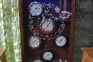 Pressure gauges in a display case built into the counter