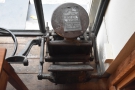 This lovely old printing press sits on the floor in the corner.