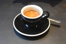 ... while my shot of the house-blend espresso was served in a classic black cup.