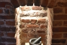 Another interesting feature is this small but glorious fireplace at the back...