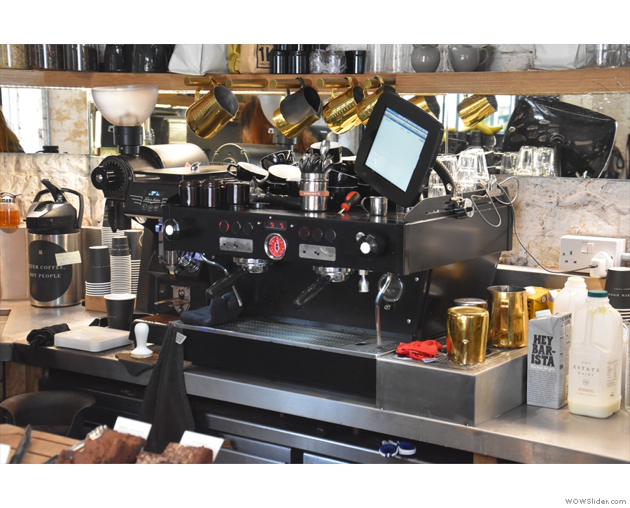 The espresso machine dispenses shot of Ozone's Empire Blend...