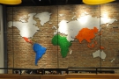 Meanwhile, spanning upstairs and down, this world map is on the wall behind the counter.