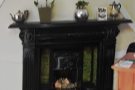 There are some lovely features, including this magnificent fireplace in the front room.