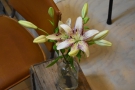 There are flowers on various tables as welll...
